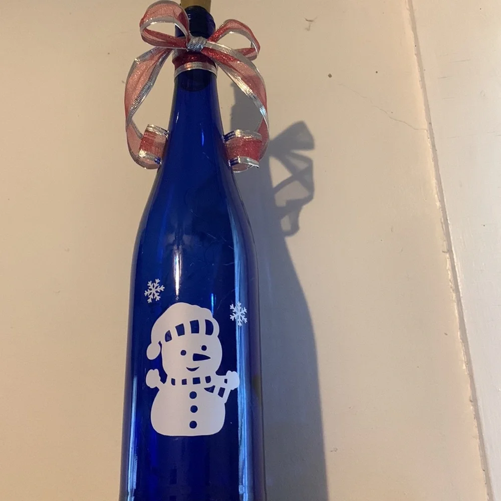 Snowman blue wine bottle lantern